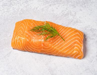 Fresh and Raw Atlantic Salmon Fillet topped with Dill