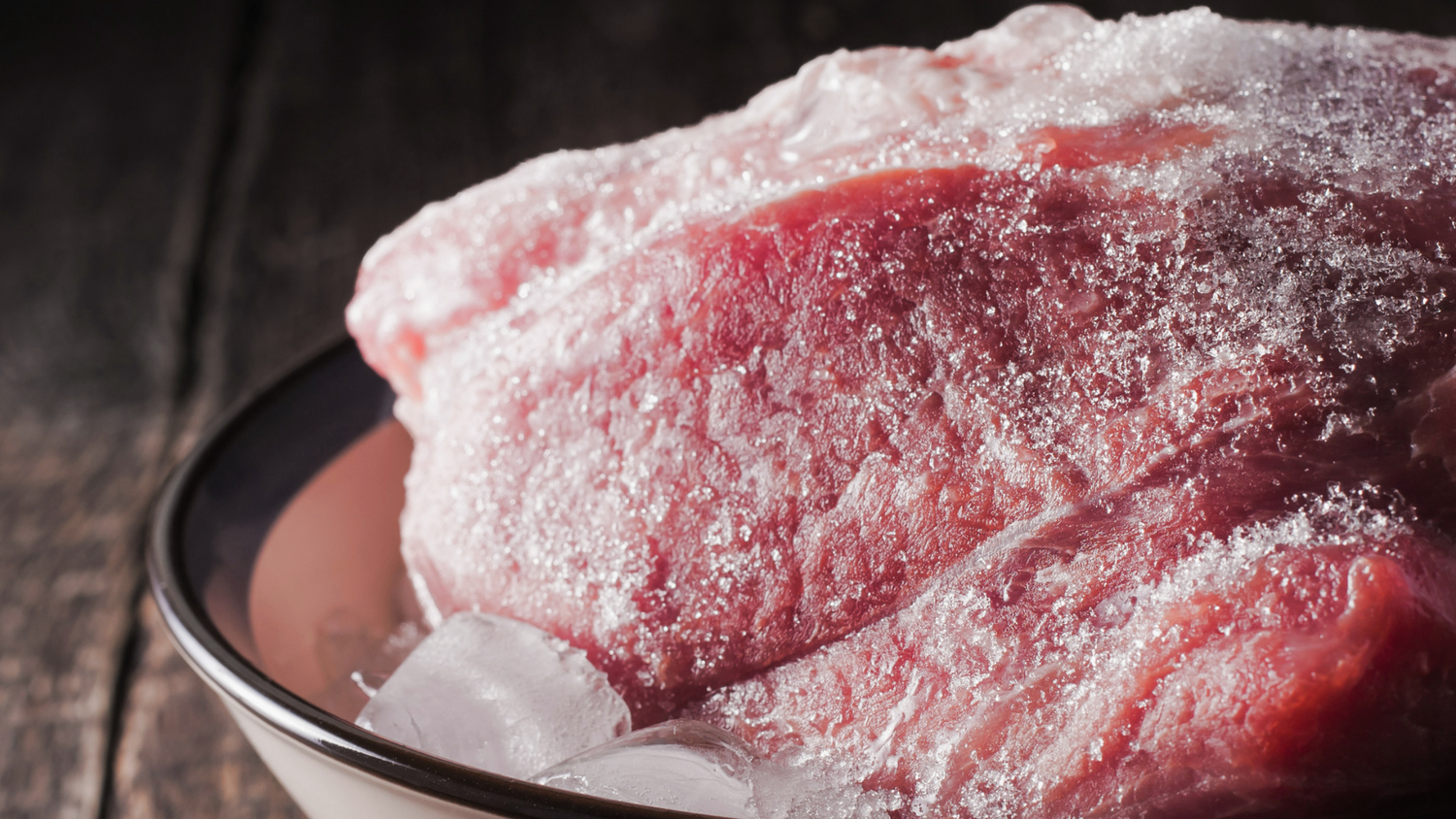 Frozen steak prepared for cooking straight from freezer