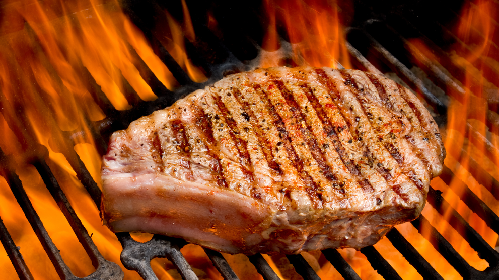 Reverse sear steak on grill with flame sear finish