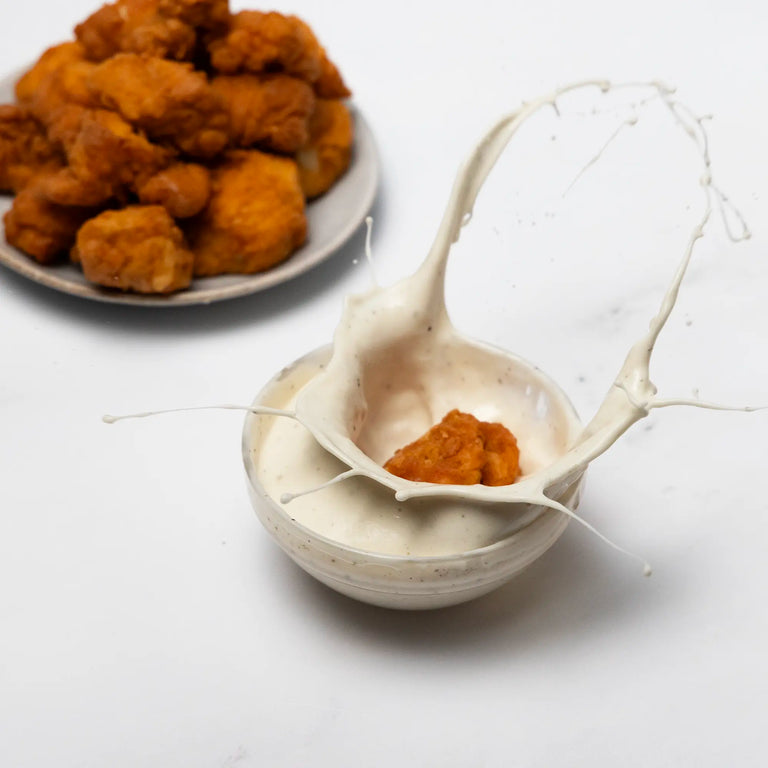 Seed Oil Free Chicken Nuggets dipped in ranch