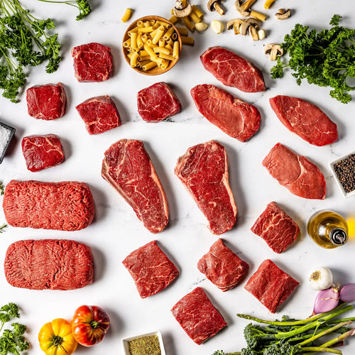 100% American beef cuts arranged with fresh veggies, herbs, mushrooms, pasta, olive oil, and seasonings—aged for a minimum of 21 days, hand cut by master butchers, and delivered right to your door.