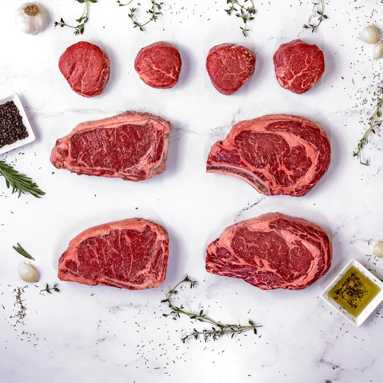 The King-Cut Box features four filet mignons, two thick-cut ribeyes, and two thick-cut NY strips. The best steaks in America - ready for delivery straight to your door.